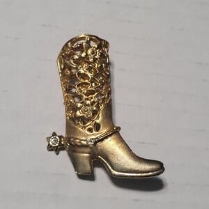 Gold tone cowboy boot brooch with rhinestone